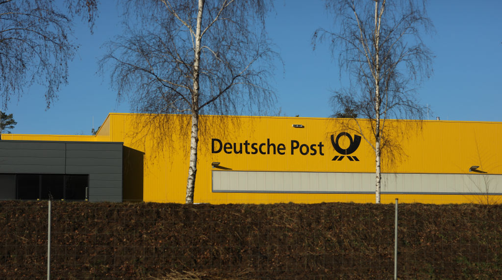 DHL unveiled plans on March 6 to cut about 8,000 jobs in Germany this year as part of a strategy to save more than €1 billion by 2027, after the logistics group reported a 7 per cent fall in annual operating profit. (Photo by Jeremy Moeller/Getty Images)
