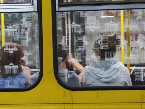 Women sit onboard a Berlin metro train. (Jon Hicks/Getty)