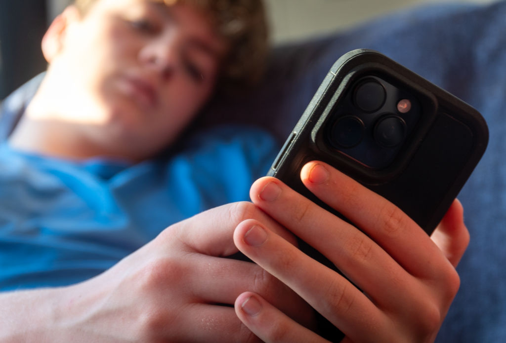 France will work with other EU member states to prevent children under 15 living across the bloc from accessing social media. (Photo by Anna Barclay/Getty Images)