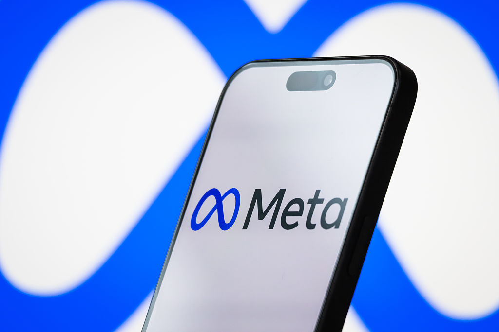 META rejects accusations from the European Privacy and Digital Rights Group (NOYB), defending their use of personal data to train AI systems as "fully compliant with EU data protection rules".  (Photo illustration by Cheng Xin/Getty Images)