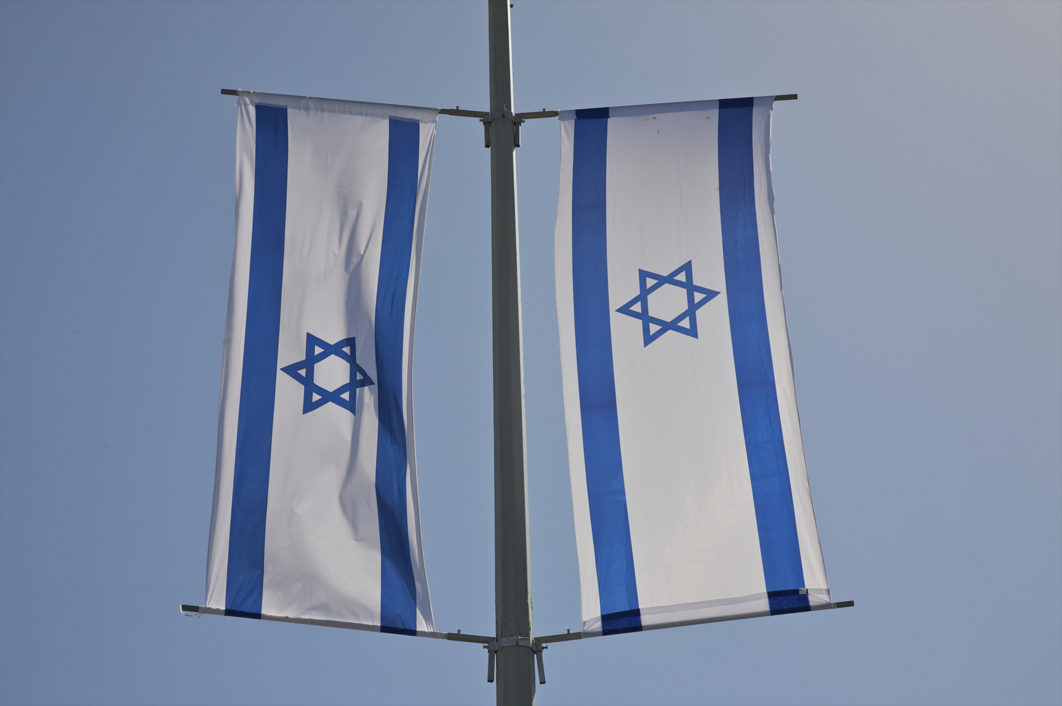 Members from PVDA, Peter Mertens and Vooruit Kathleen Van Brempt call for the Israeli flag to be taken down from Antwerp City Hall, arguing that flying the flag at this moment sends the wrong message. Getty