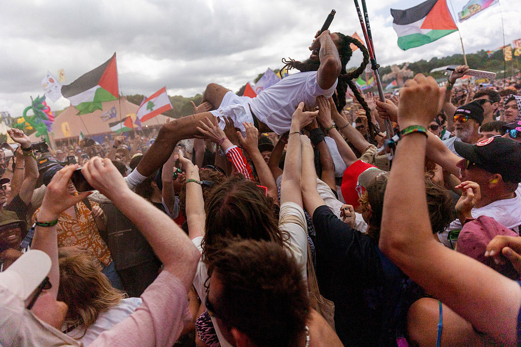 Punk duo Bob Vylan and rap group Kneecap’s sets at Glastonbury have triggered criminal probes, a revoked US visa, and accusations of hate speech, once again forcing Western democracies to confront the dilemma between free political expression and incitement. (Photo by Matt Cardy/Getty Images)