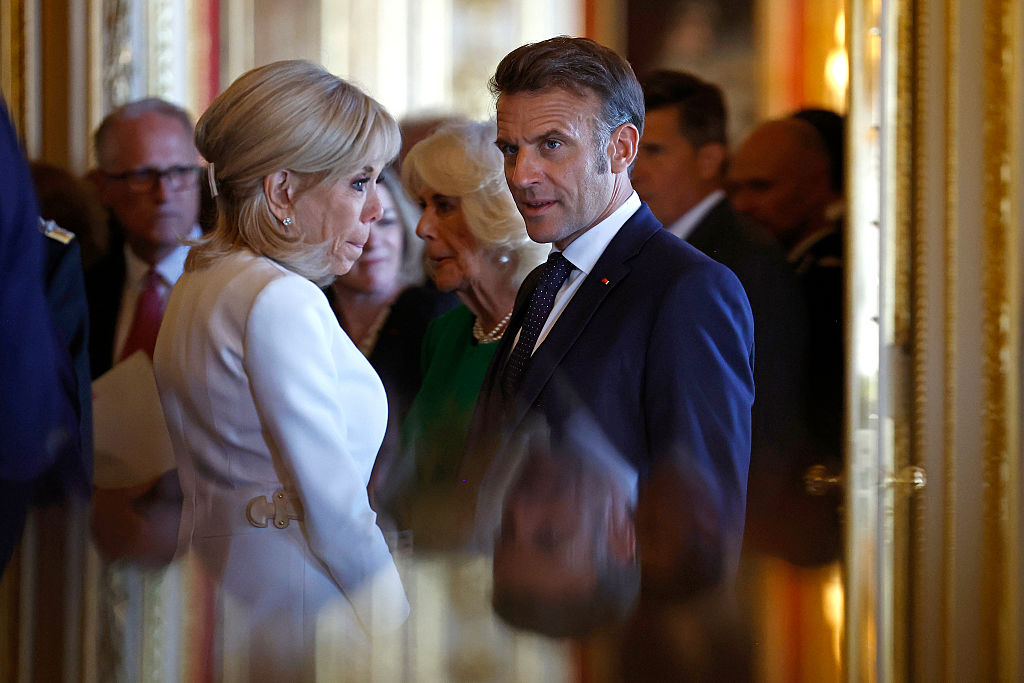French President Emmanuel Macron and his wife, Brigitte Macron, have launched a defamation lawsuit on July 23 against US podcaster and right-wing political commentator Candace Owens.  (Photo by Benjamin Cremel - WPA Pool/Getty Images)