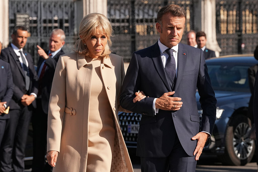France's first lady has taken her case against two women over claims she used to be a man to the highest appeals court after a lower court let them off, her lawyer said July 14. (Photo by Carlos Jasso - WPA Pool/Getty Images)