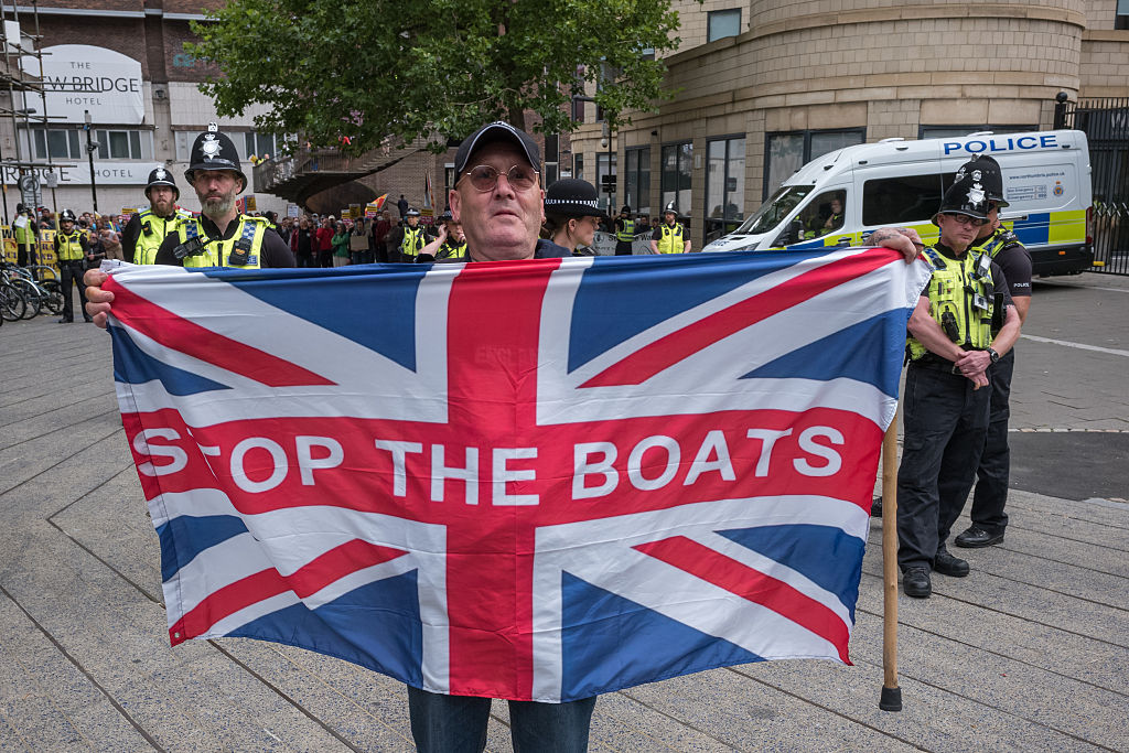 Demonstrators gather during an anti-immigration protest outside the New Bridge Hotel in Newcastle on August 09, 2025 in Newcastle upon Tyne, England. (Photo by Ian Forsyth/Getty Images)
