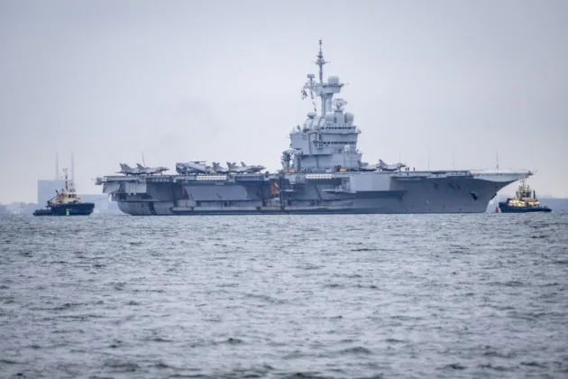 NATO forces were forced to intercept a suspected Russian drone heading toward France’s 800-foot-long aircraft carrier, the Charles de Gaulle, in what was described as a “serious security” incident in Malmö, Sweden, SVT reported.(Photo by JOHAN NILSSON / TT News Agency via AFP)