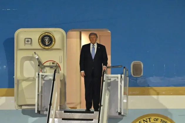 Trump lands in Beijing