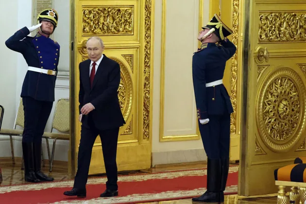 Putin accuses NATO of preparing for war on Russia