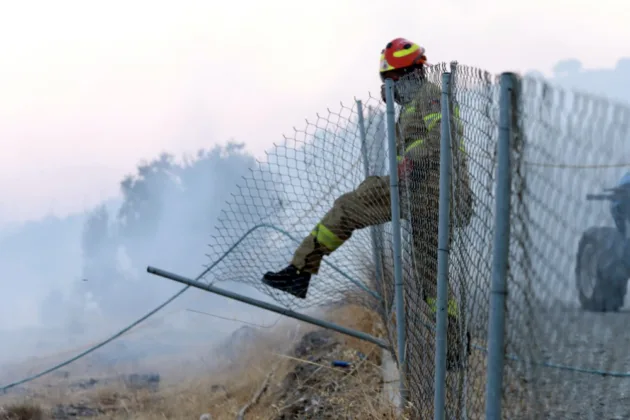 Three firefighters die in Greek wildfires as EU warns blazes are moving east
