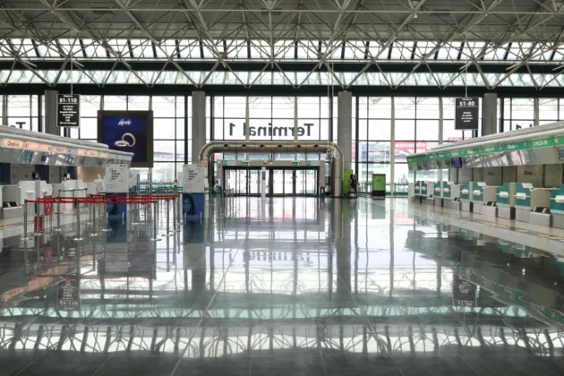 Airport signs mark Italy's unilateral Schengen suspension on Spanish arrivals
