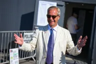 Farage returns to Westminster with bigger vote in boycotted Clacton by-election