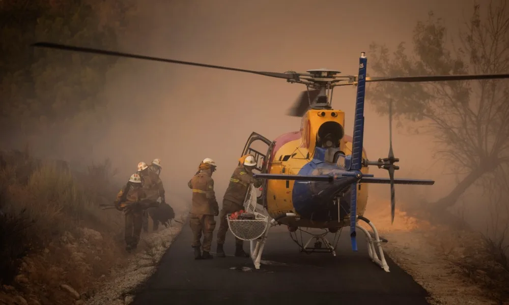 Wildfires spread across northern Portugal as prime minister warns of weeks of risk