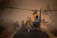 Wildfires spread across northern Portugal as prime minister warns of weeks of risk