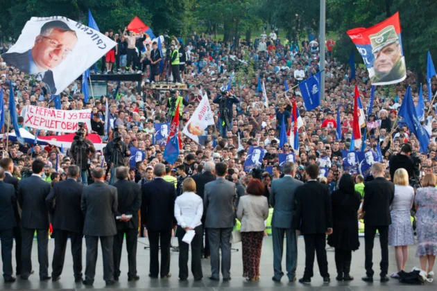 Cursing over Mladić's coffin while bowing before the Syrian jihadist?