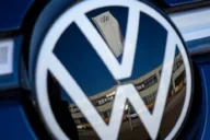 Volkswagen workers threaten strikes as carmaker scraps labour deals