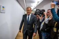 Tusk&rsquo;s hard line on migration contradicted by retreat from penalising aid to illegal migrants