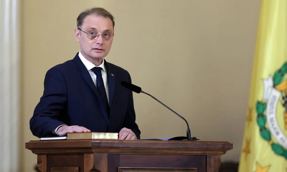 Romanian MPs back minority government, ending six-month deadlock