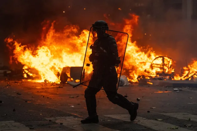 France extends city curfews after first calm night since riots