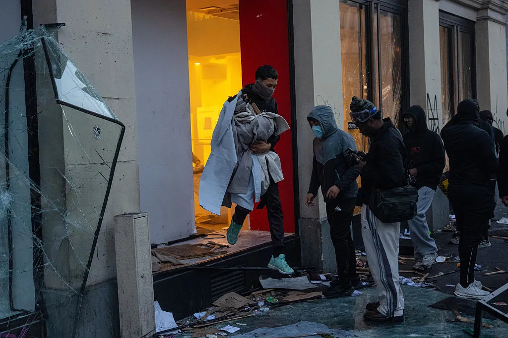 France moves to cut welfare benefits for convicted looters and rioters
